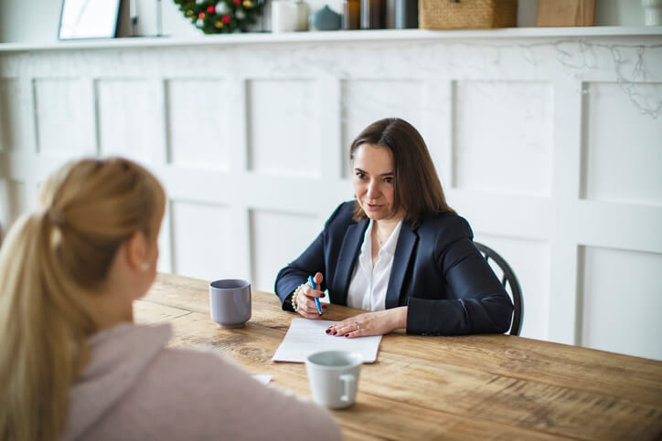 Woman meeting with employment attorney
