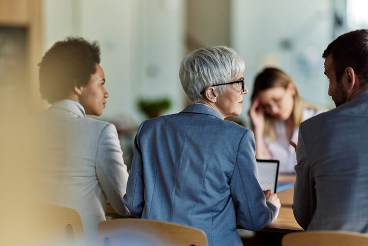 People sitting in a meeting at work