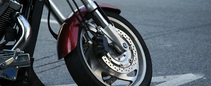 A close-up picture of a motorcycle wheel